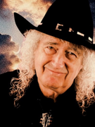 Náhledový obrázek k článku Když andělé zavolali Steva Croppera. V posmrtném singlu ho provází Brian May a Billy F.  Gibbons